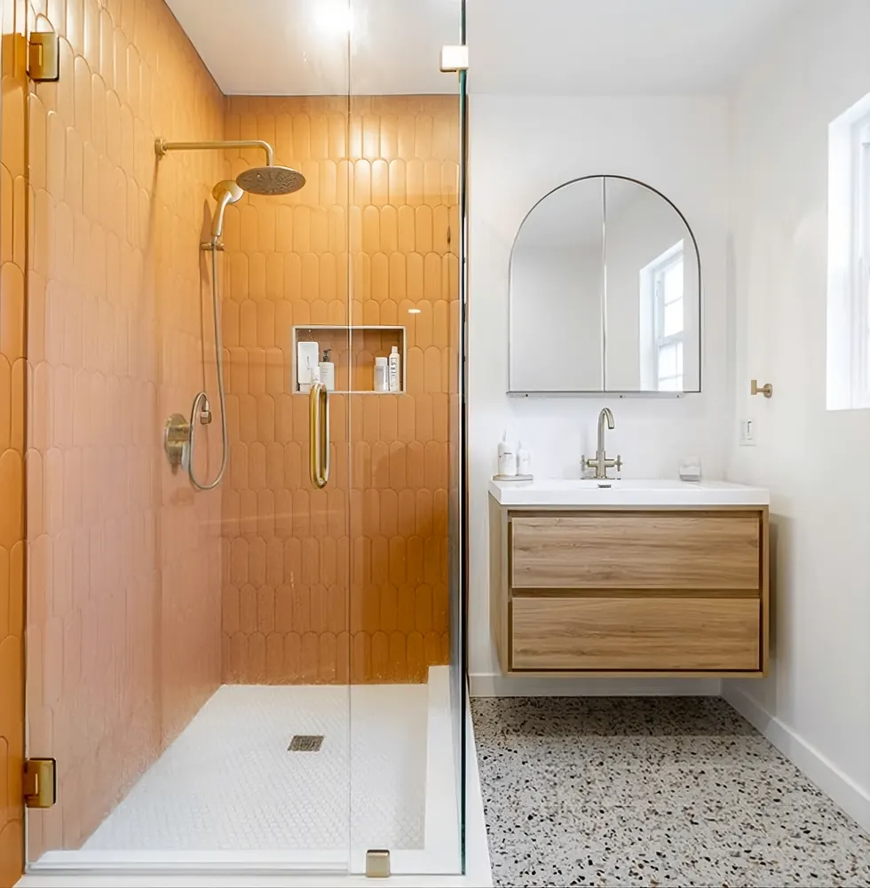 Walk-in shower remodel with warm terracotta tile